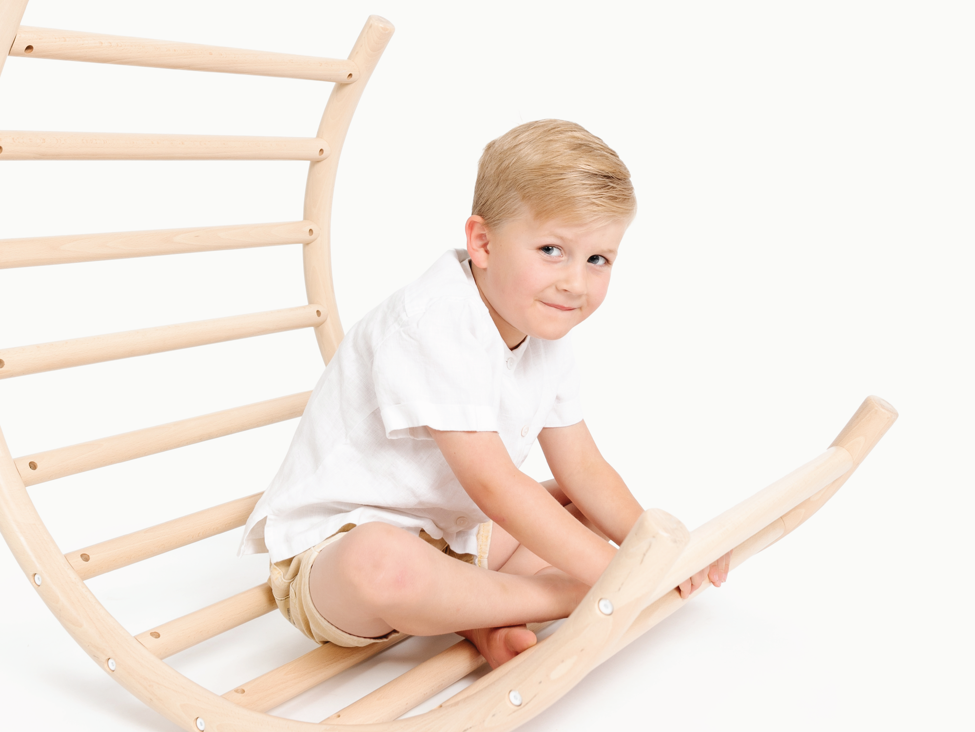 Boy sitting on Play Gym