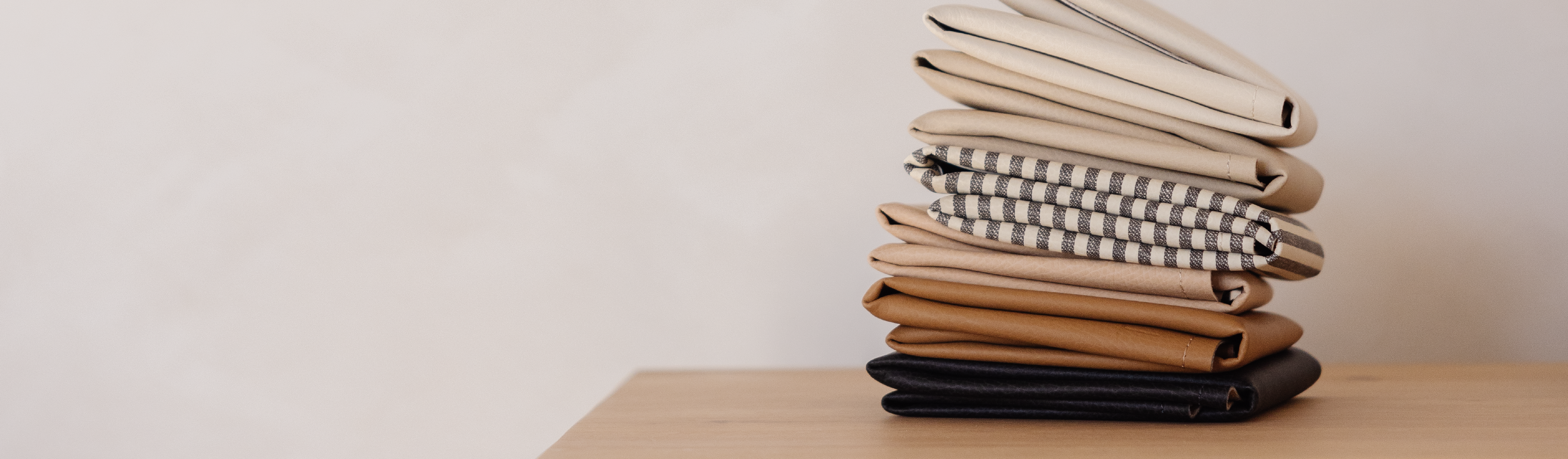 Stack of Gathre Mats  on a table