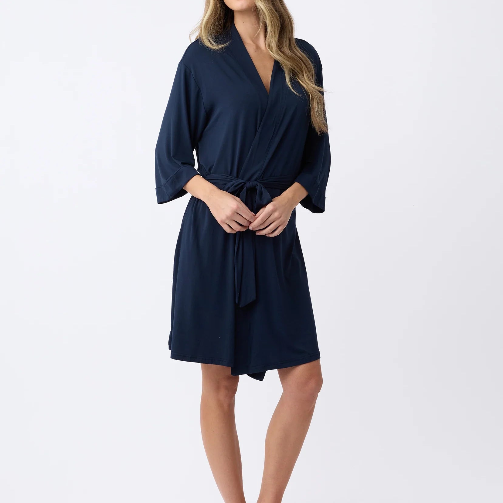 Navy@woman wearing a navy cozy earth robe