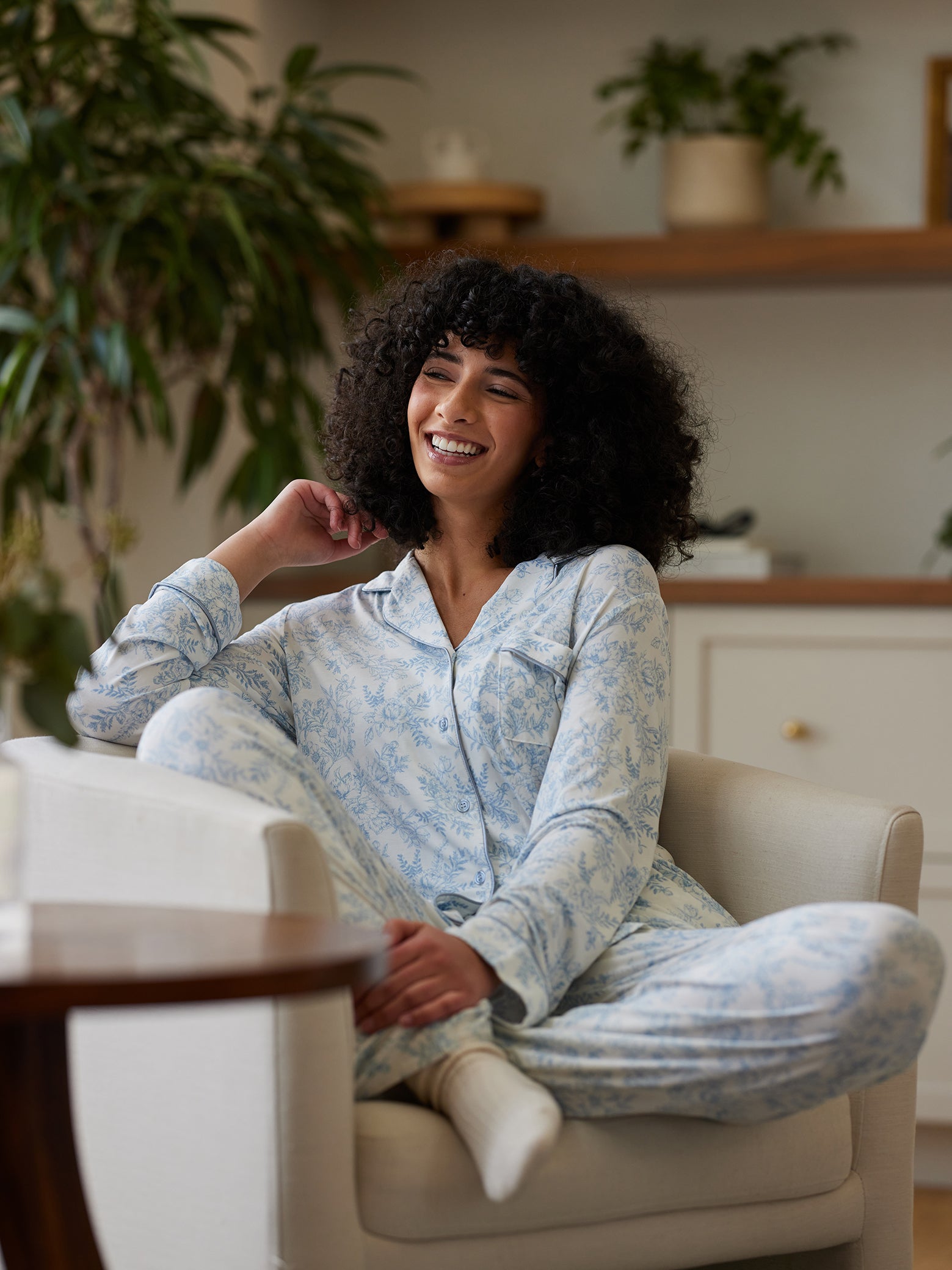 Sky Toile@woman wearing sky toile cozy earth pajamas