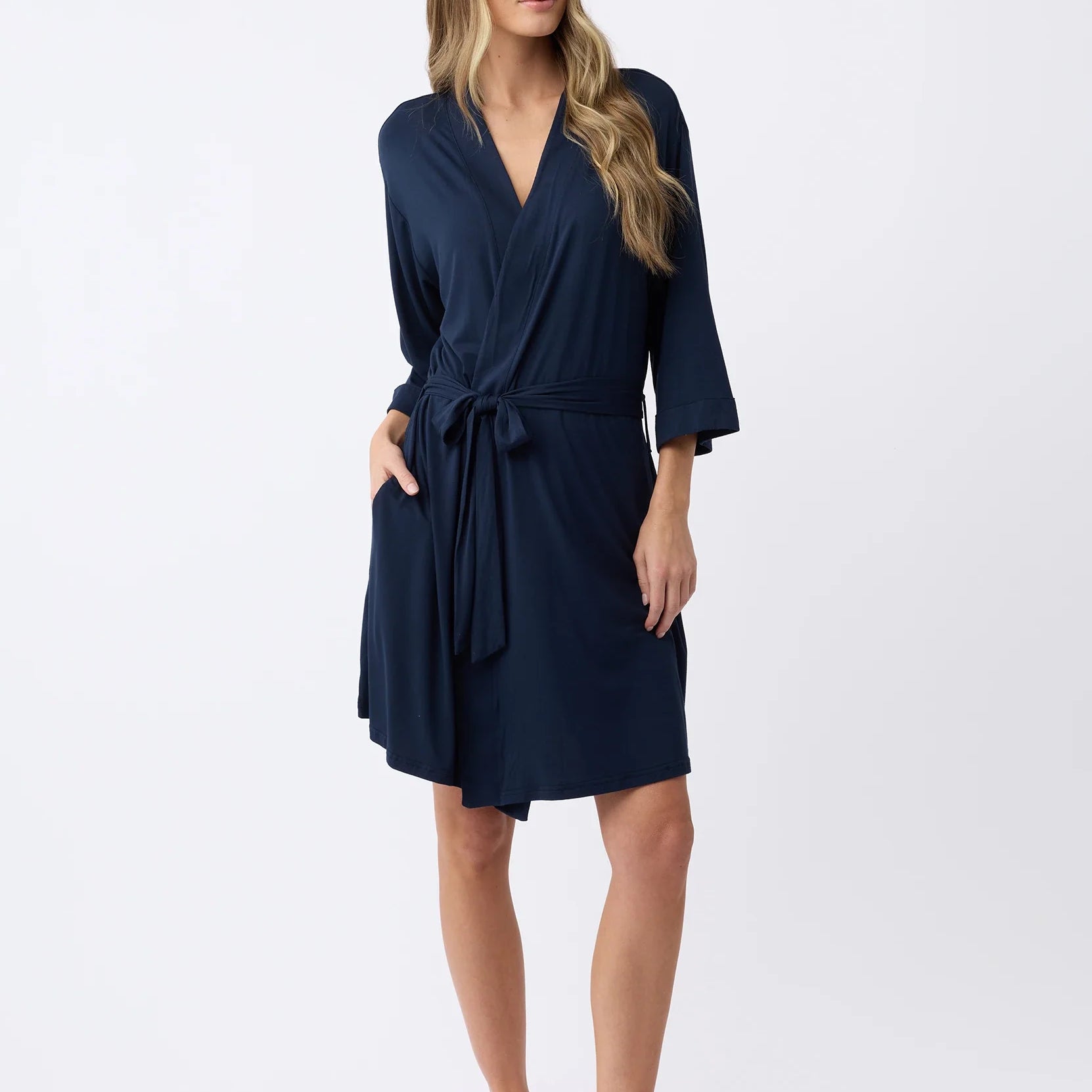 Navy@woman wearing a navy cozy earth robe