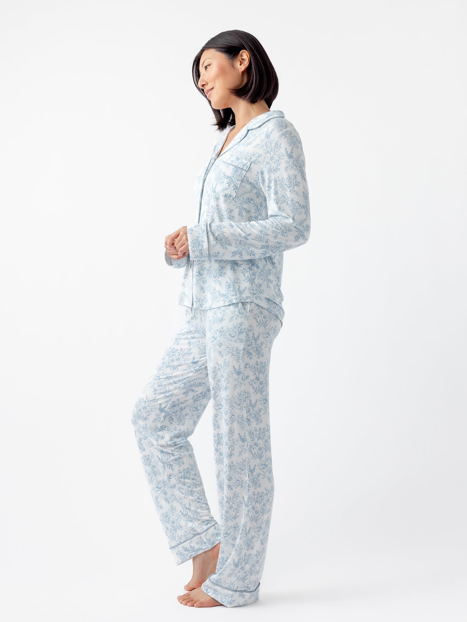 Sky Toile@woman wearing sky toile cozy earth pajamas