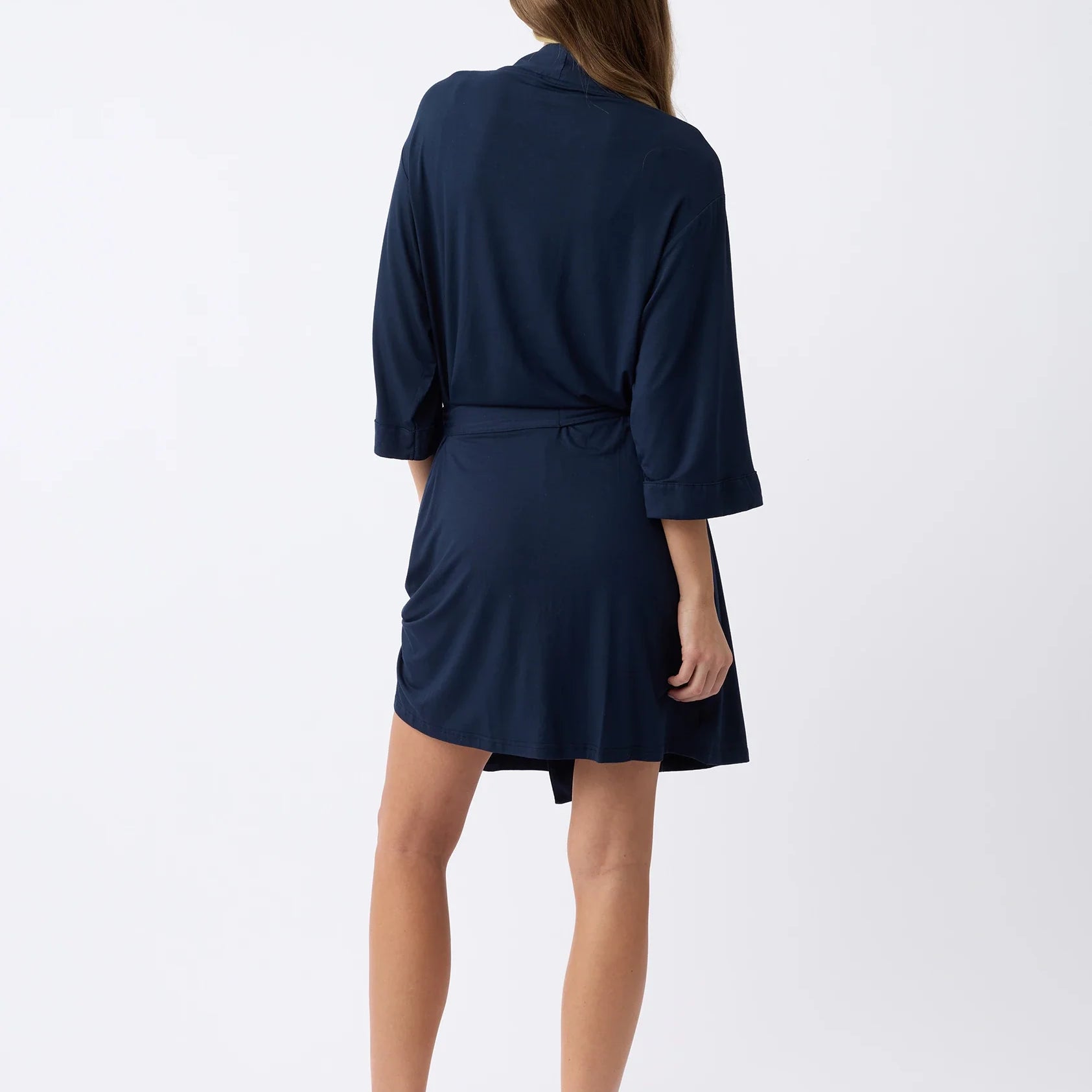 Navy@woman wearing a navy cozy earth robe