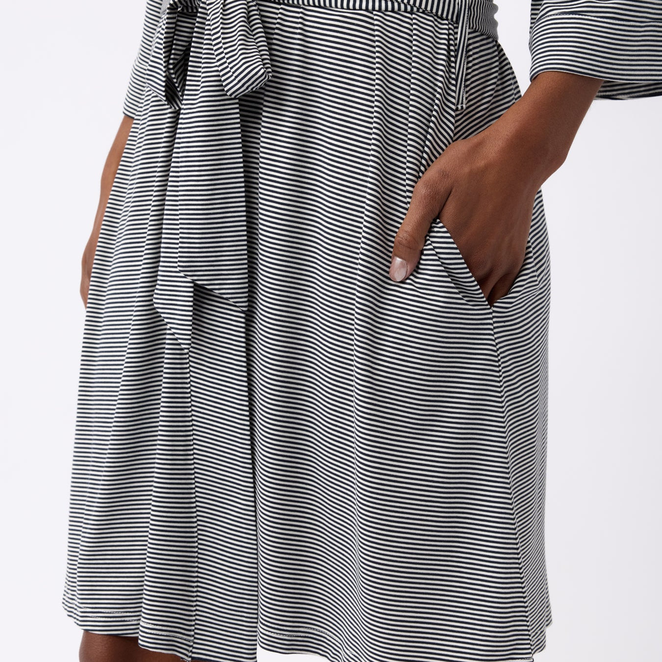 Eclipse Mini Stripe@woman wearing a eclipse mini stripe cozy earth robe