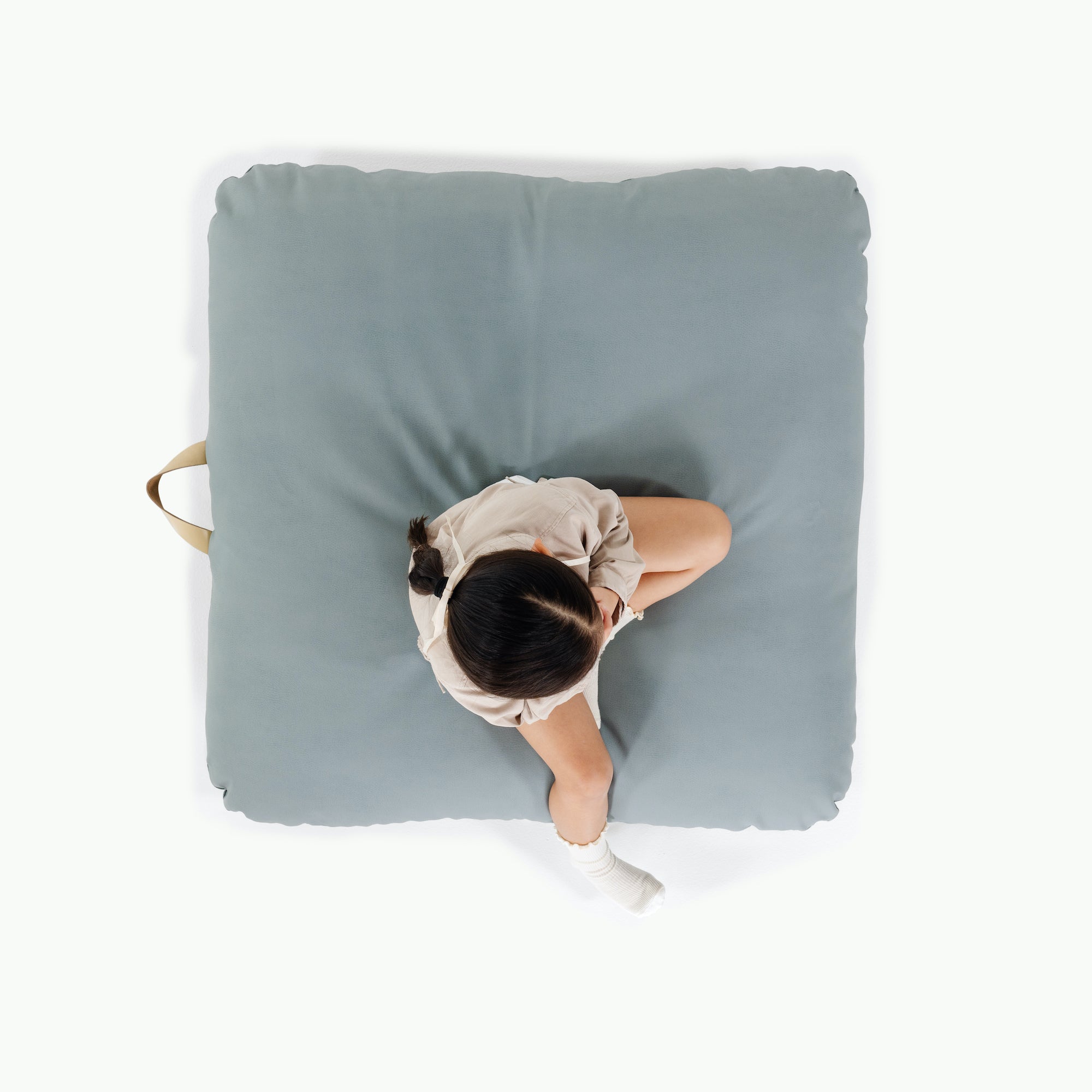 Amalfi (on sale) / Square@overhead of girl on cushion