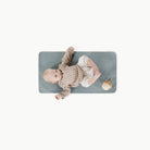 Amalfi (on sale)@overhead of baby laying on the amalfi micro+ mat
