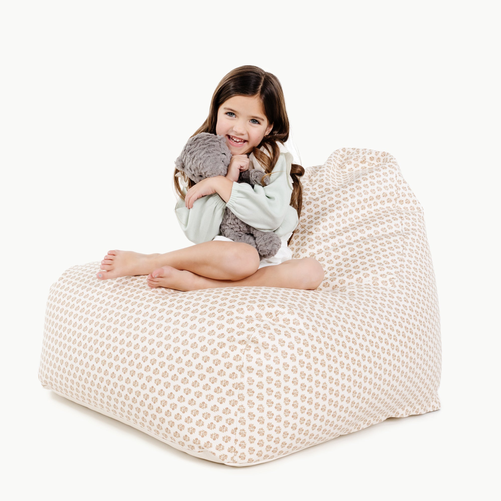 Bloom (on sale)@kid sitting on the bloom lounger