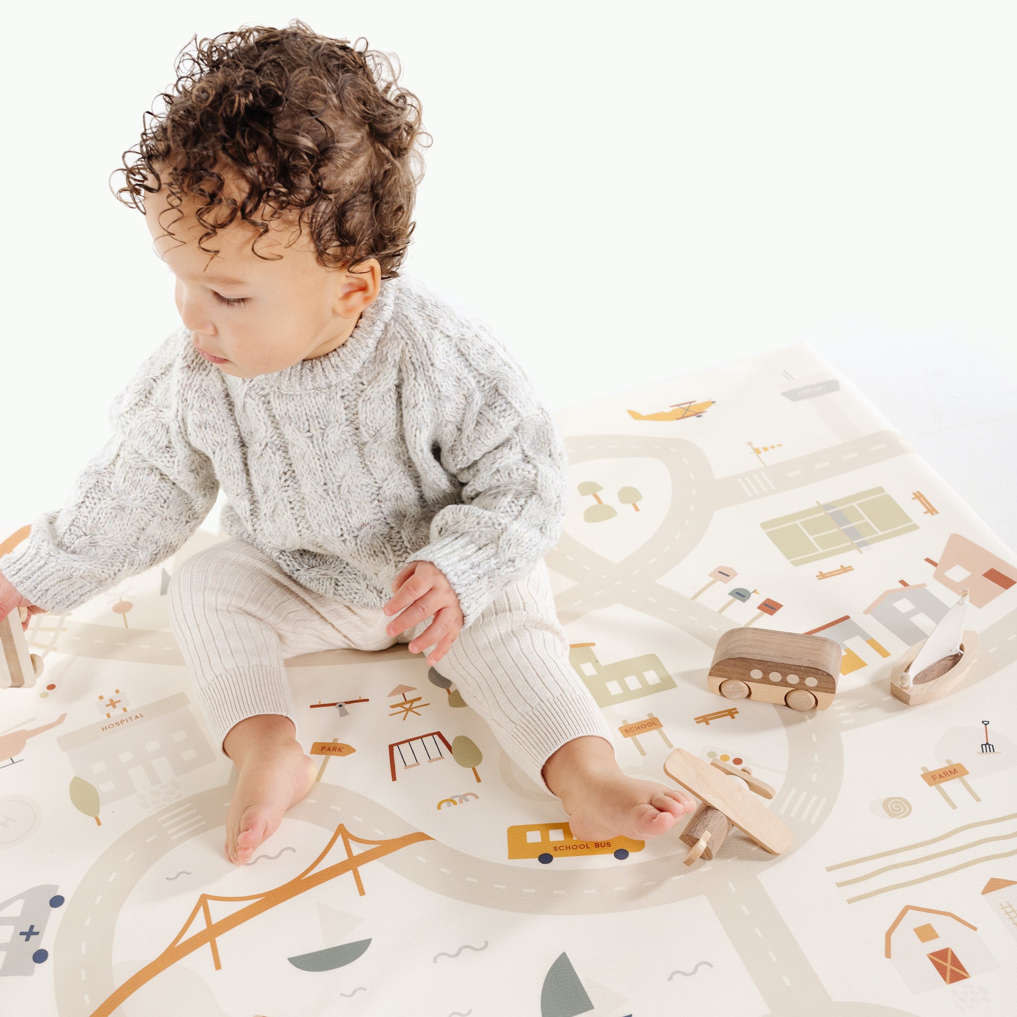 Boulevard@Little boy playing on Padded Mini+