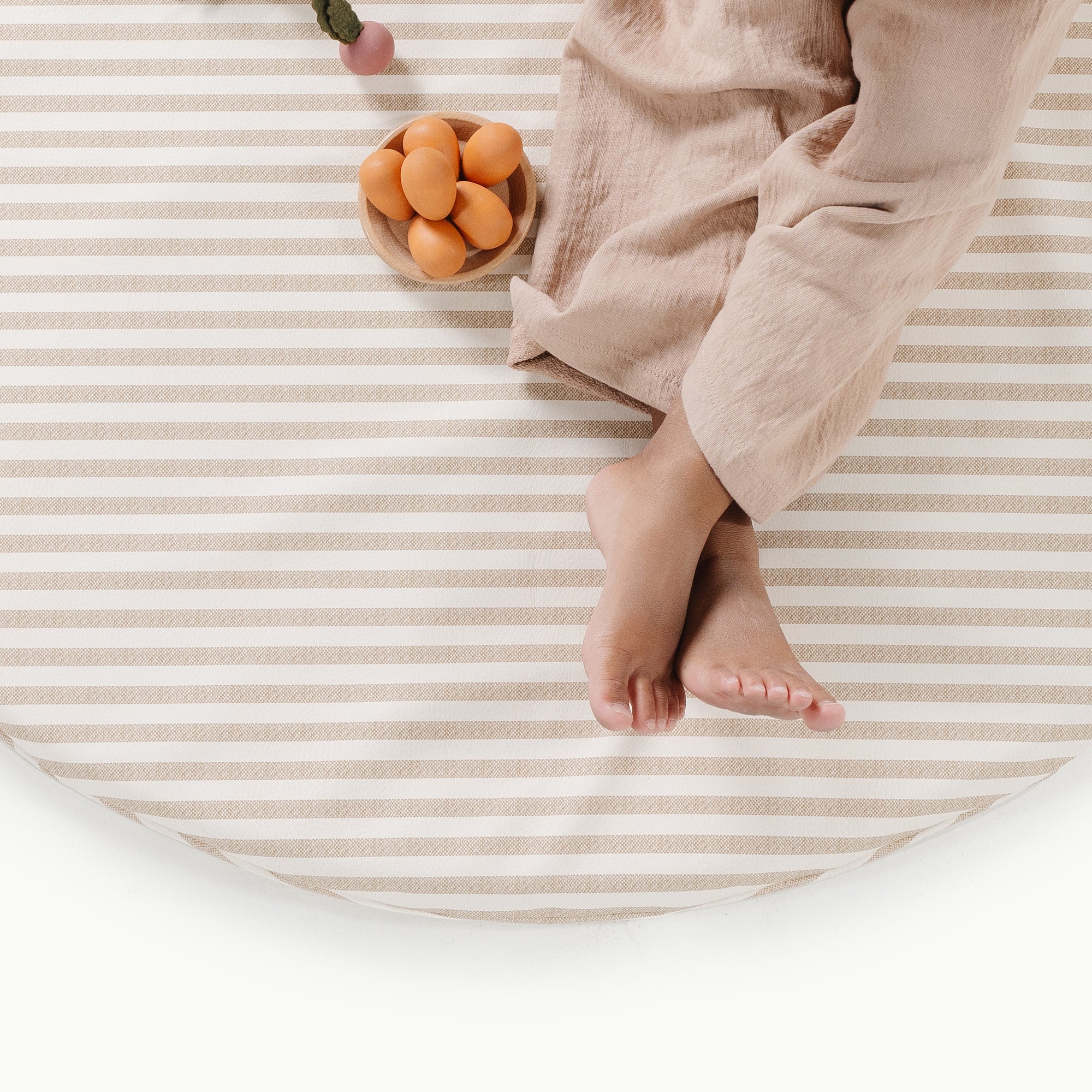 Cafe Stripe / Circle@Gathre deboss on the Cafe Stripe Padded Mini Circle Mat