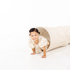 Cafe Stripe@little girl playing in tunnel