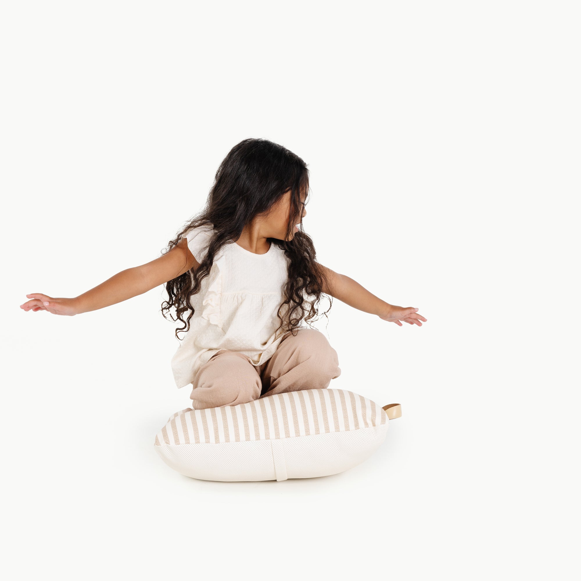 Cafe Stripe / Square@kid sitting on the cafe stripe mini square floor cushion