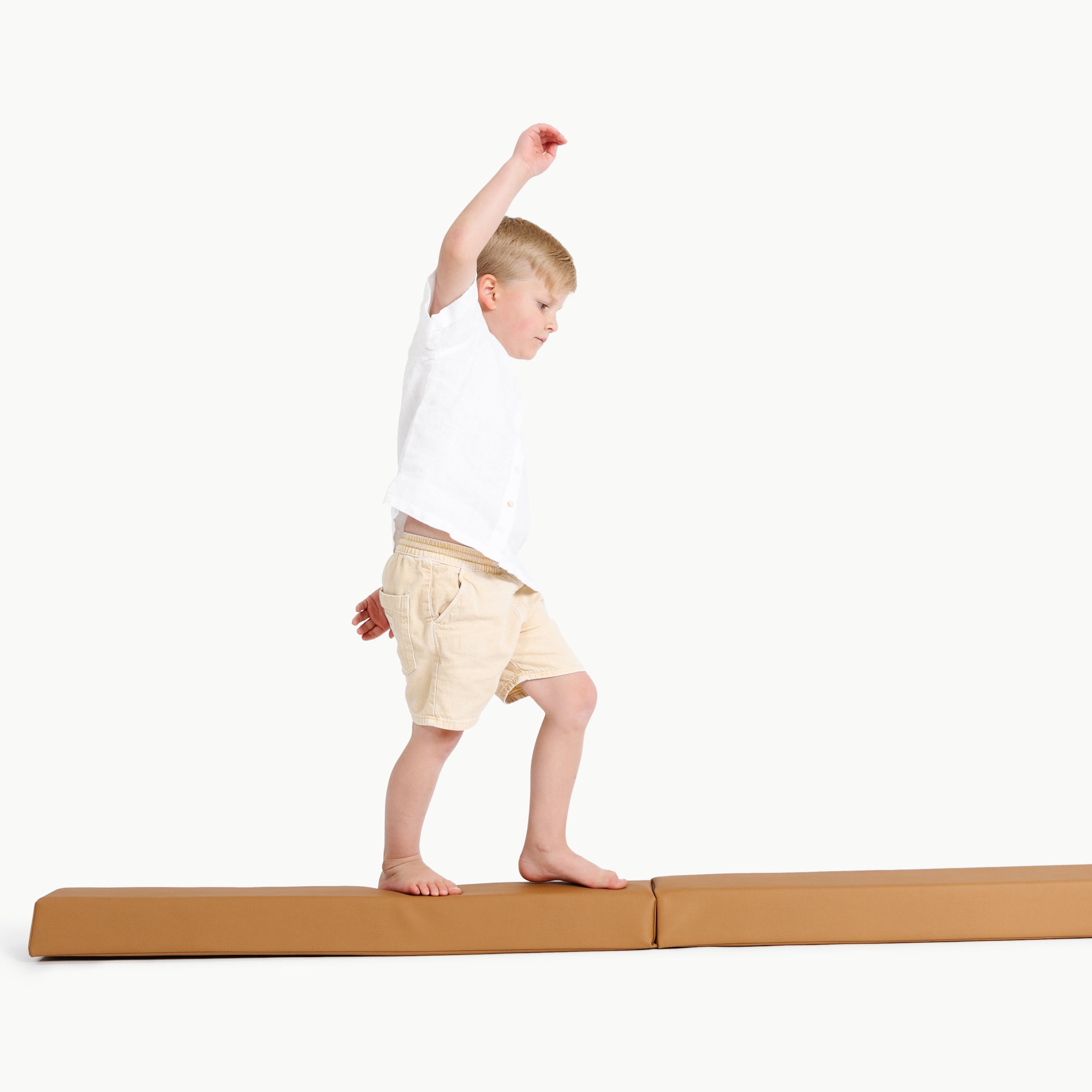 Camel@kid playing on the camel balance beam