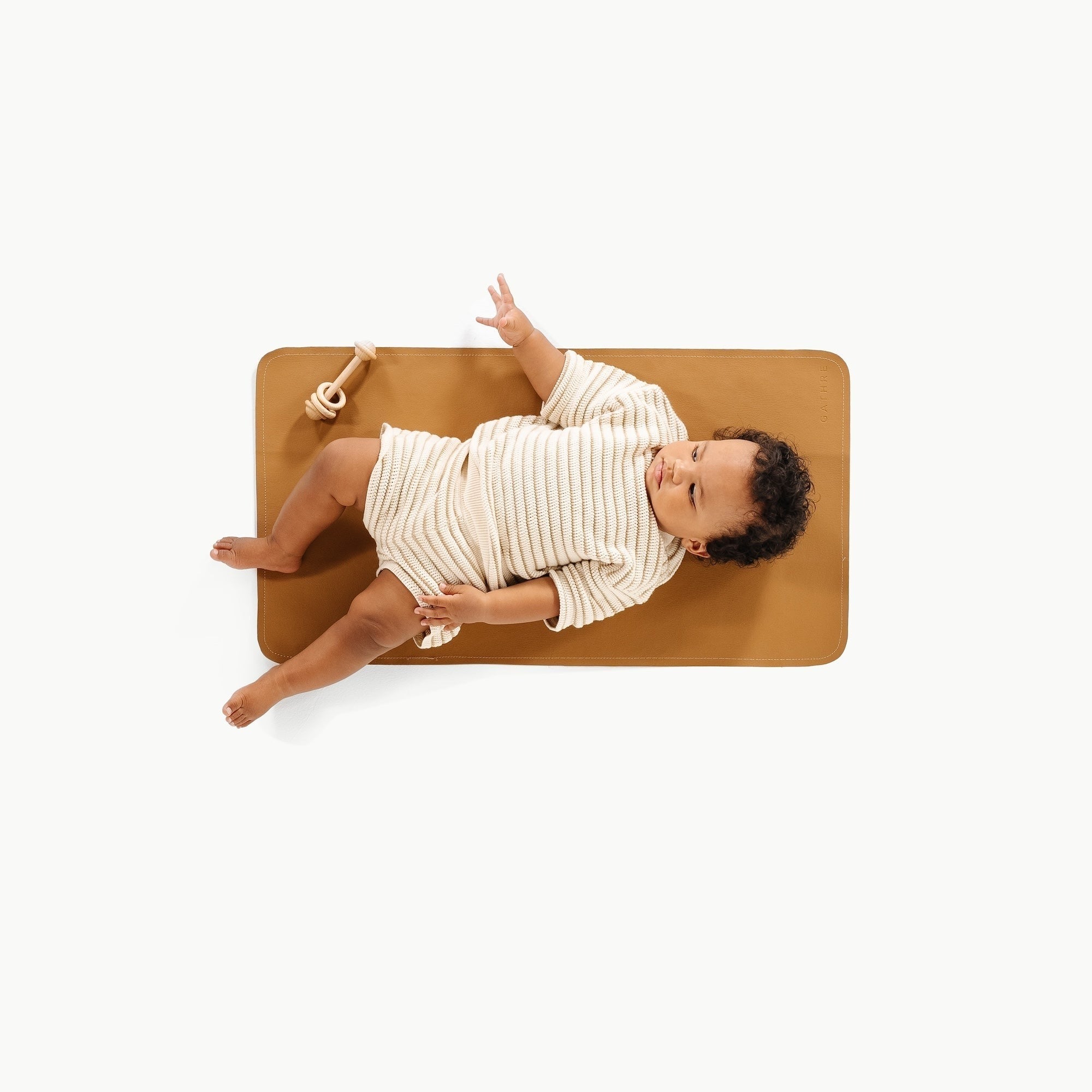Camel@overhead of baby on micro+ mat