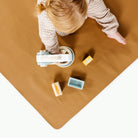 Camel@Overhead kid sitting on the Camel Mini Mat