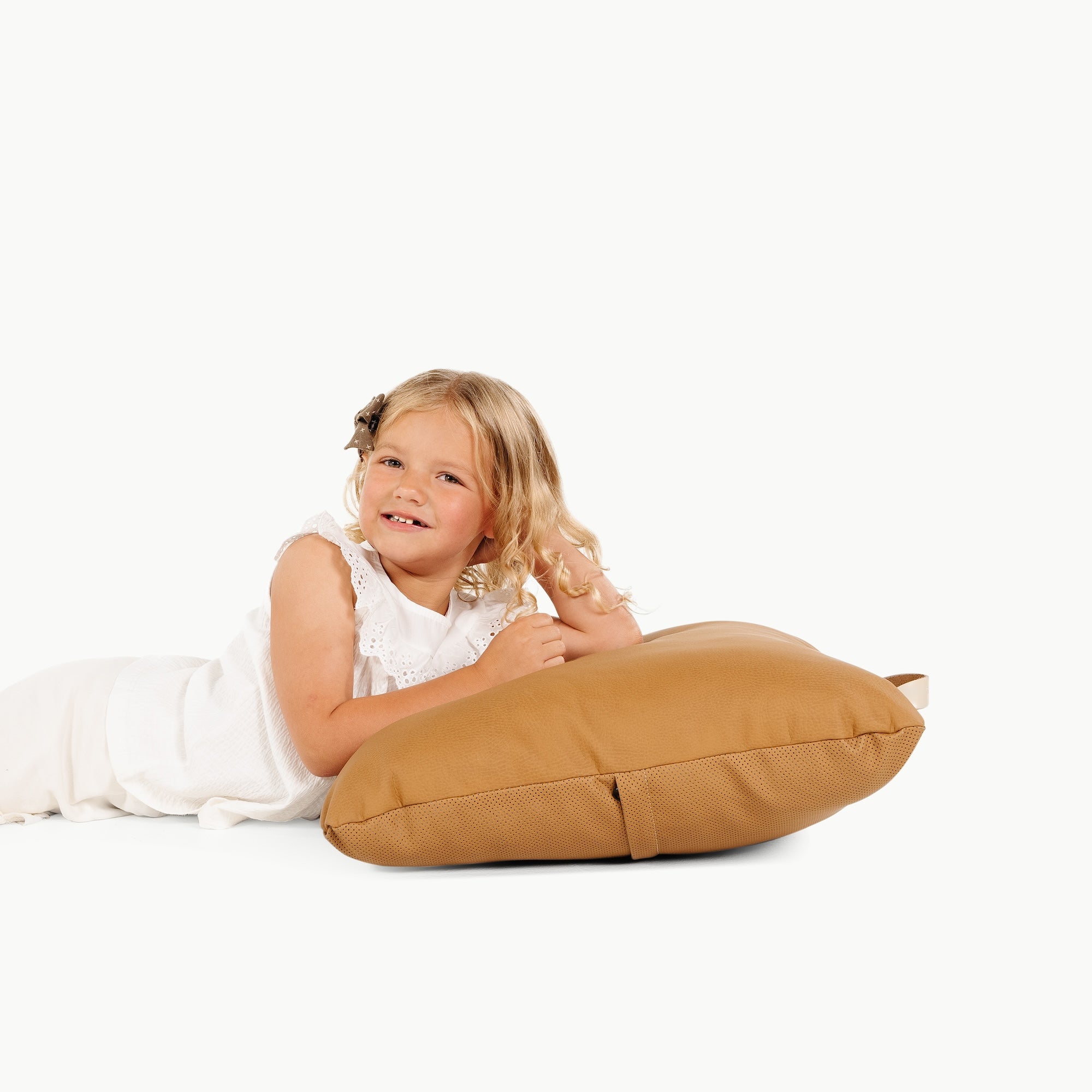 Camel / Square@Little girl sitting on the Camel Mini Square Floor Cushion