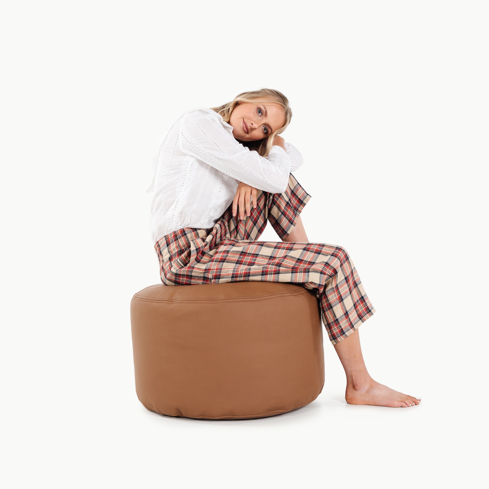 Cedar (on sale)@woman sitting on the cedar circle pouf