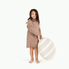 Pencil Stripe (on sale) / Circle@kid holding the pencil stripe mini circle floor cushion