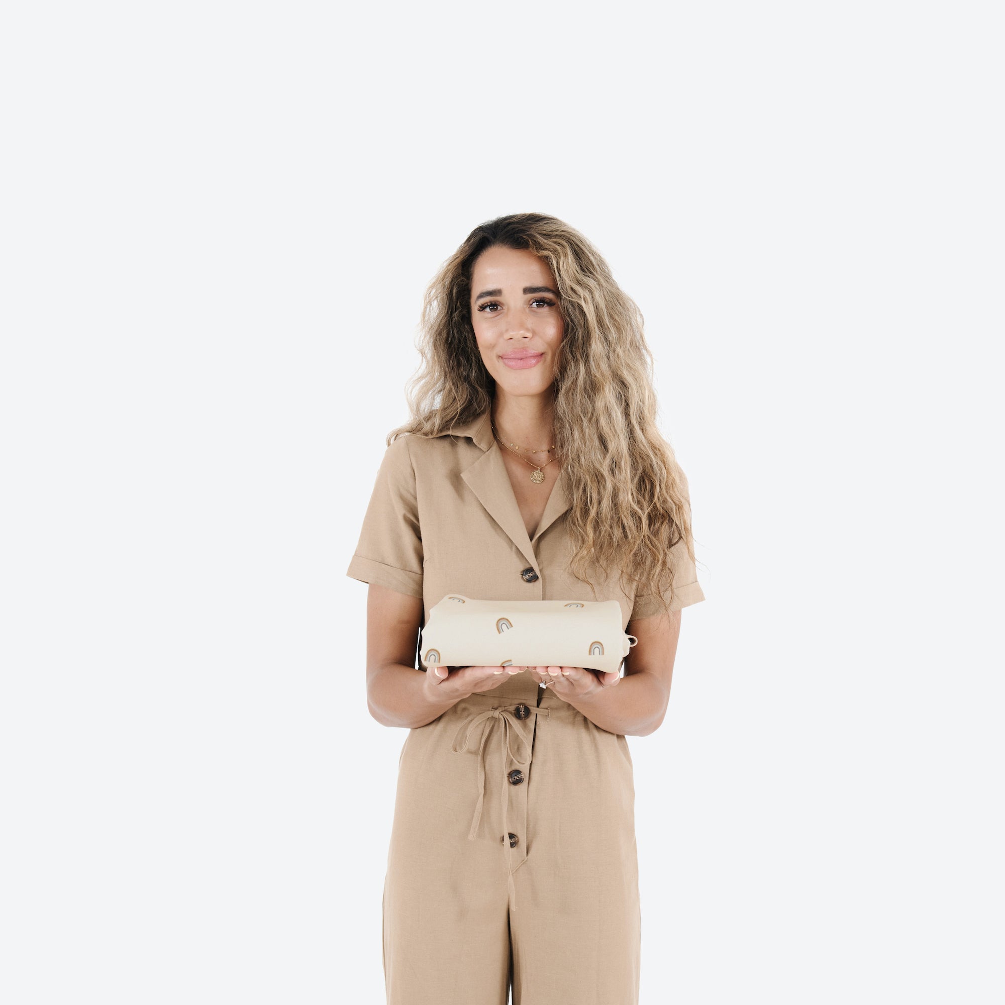 Tiny Rainbow (on sale) / Square@Woman holding a folded up Tiny Rainbow Maxi Square