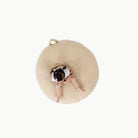 Créme (on sale) / Circle@overhead of girl sitting on cushion