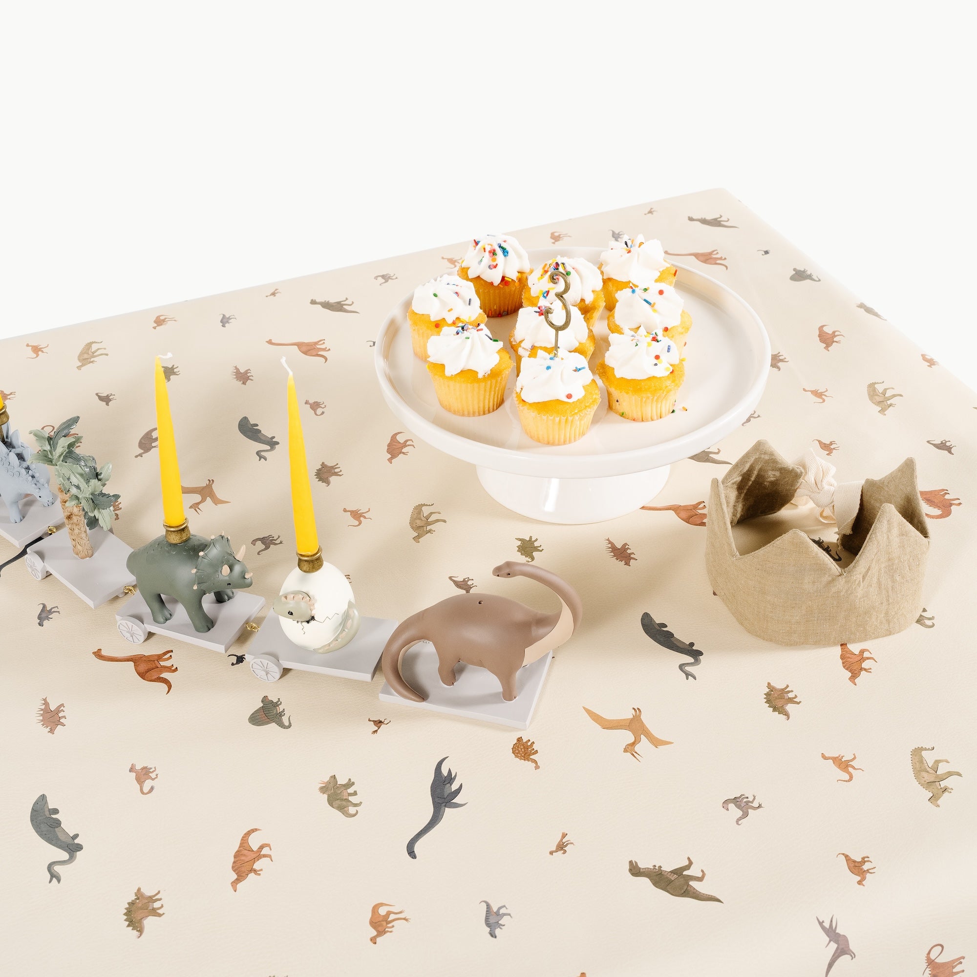 Dinosauria (on sale)@overhead of dinosauria tablecloth on table