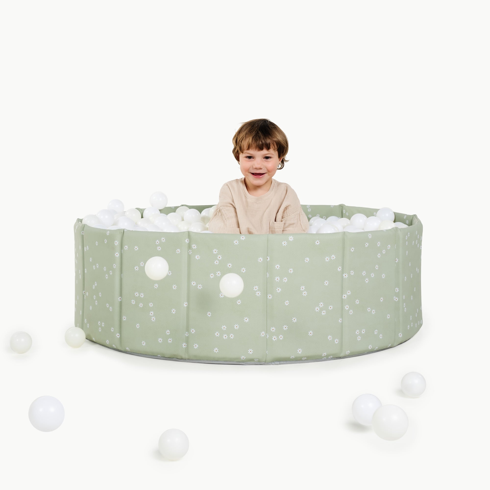 Flora@toddler playing in ball pit