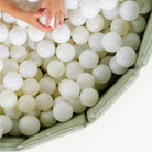 Flora@overhead close up of ball pit