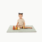 Flora@girl playing on mini mat