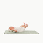 Flora@baby laying on a micro+ changing mat