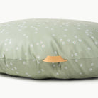 Flora / Circle@handle detail on floor cushion