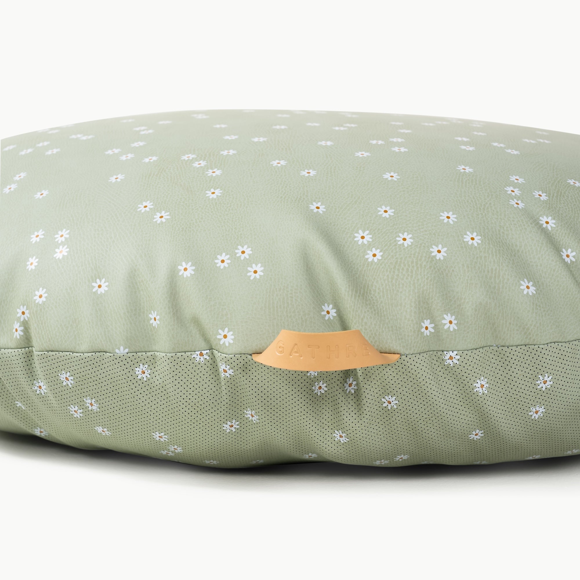 Flora / Circle@handle detail on floor cushion