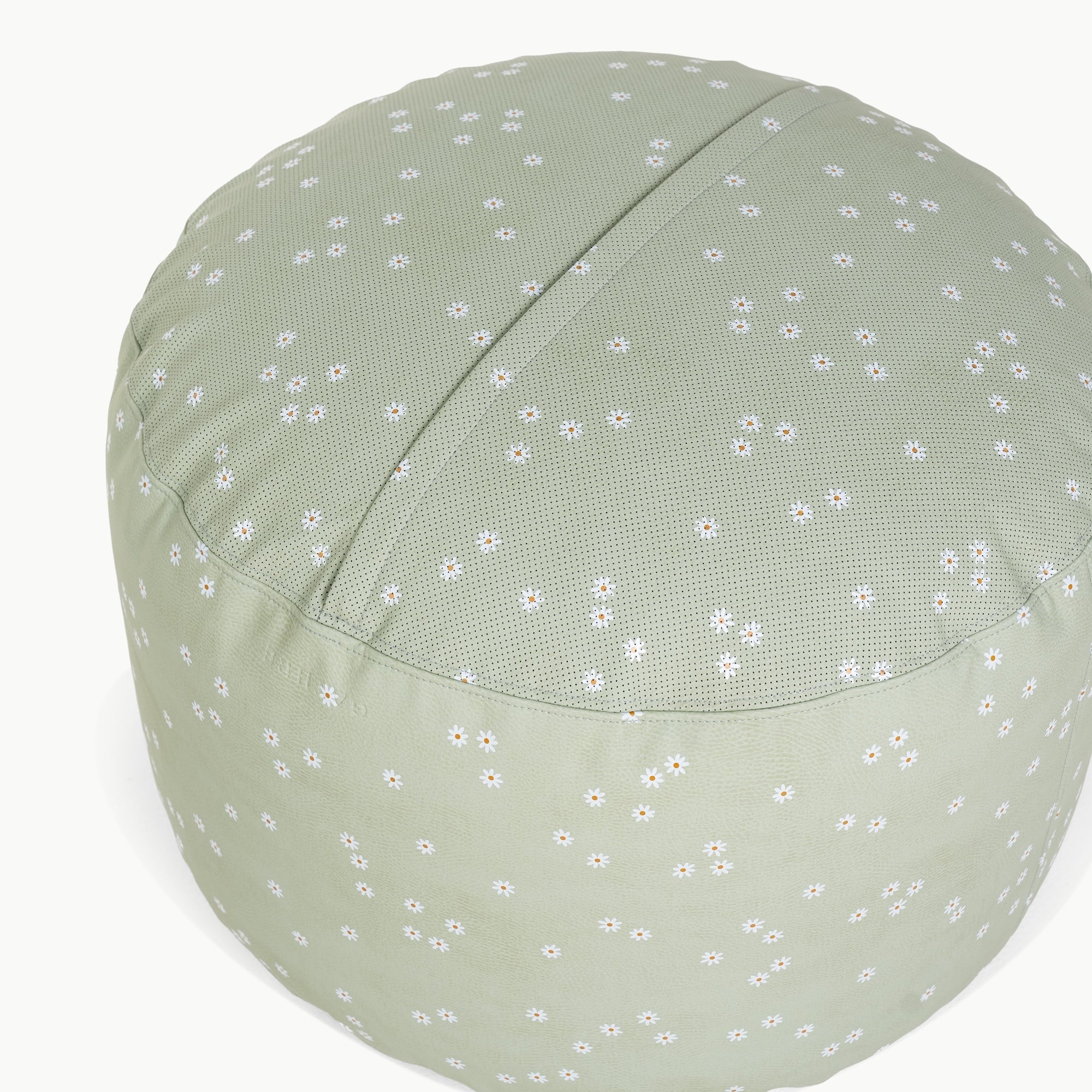 Flora@zipper detail on circle pouf