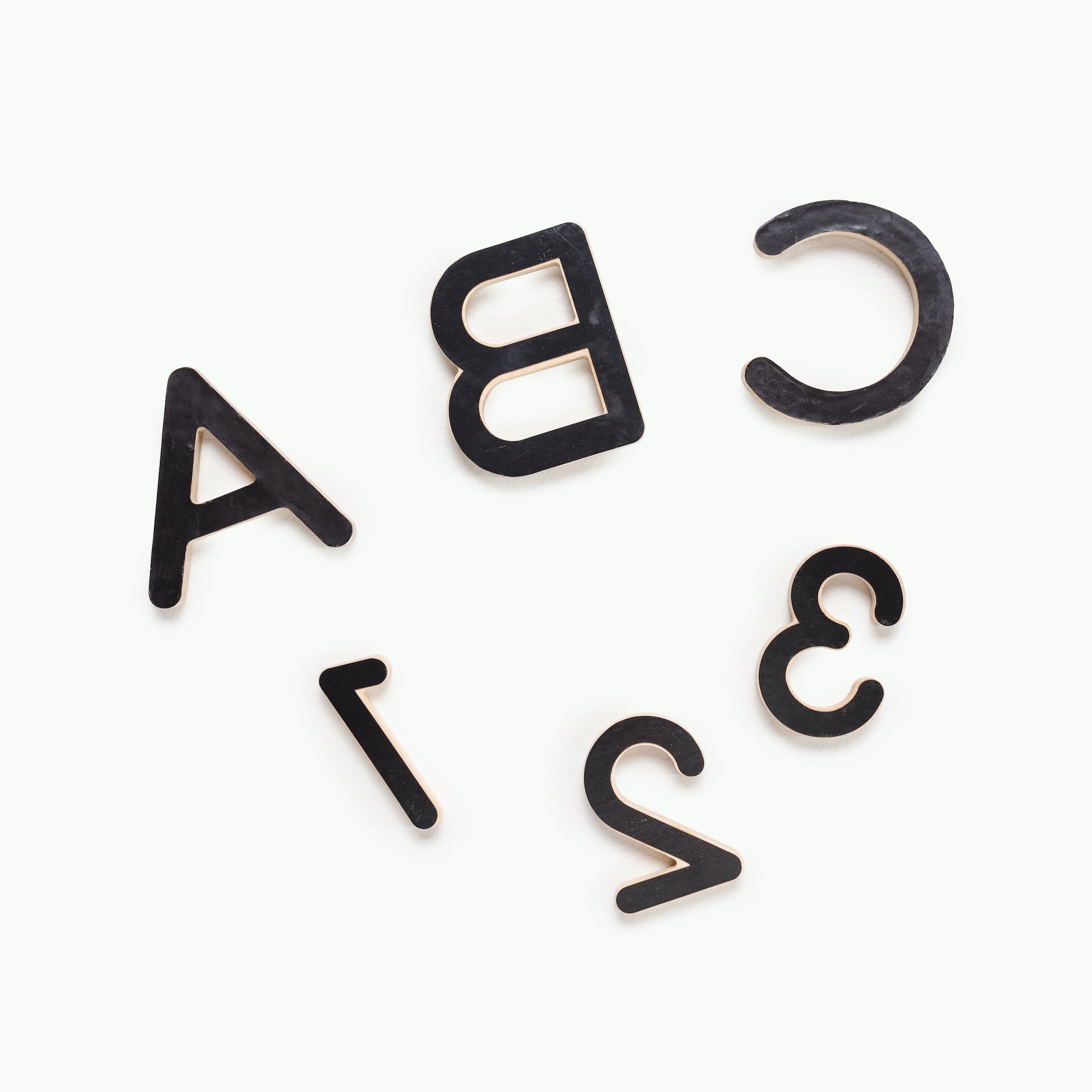 Birch@back side of wooden letters