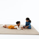 Ember (on sale)@kid playing on the ember padded midi+