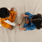 Ember (on sale)@kid playing on the ember padded midi+