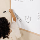 Beech@Kid drawing on the whiteboard side of the Chalkboard