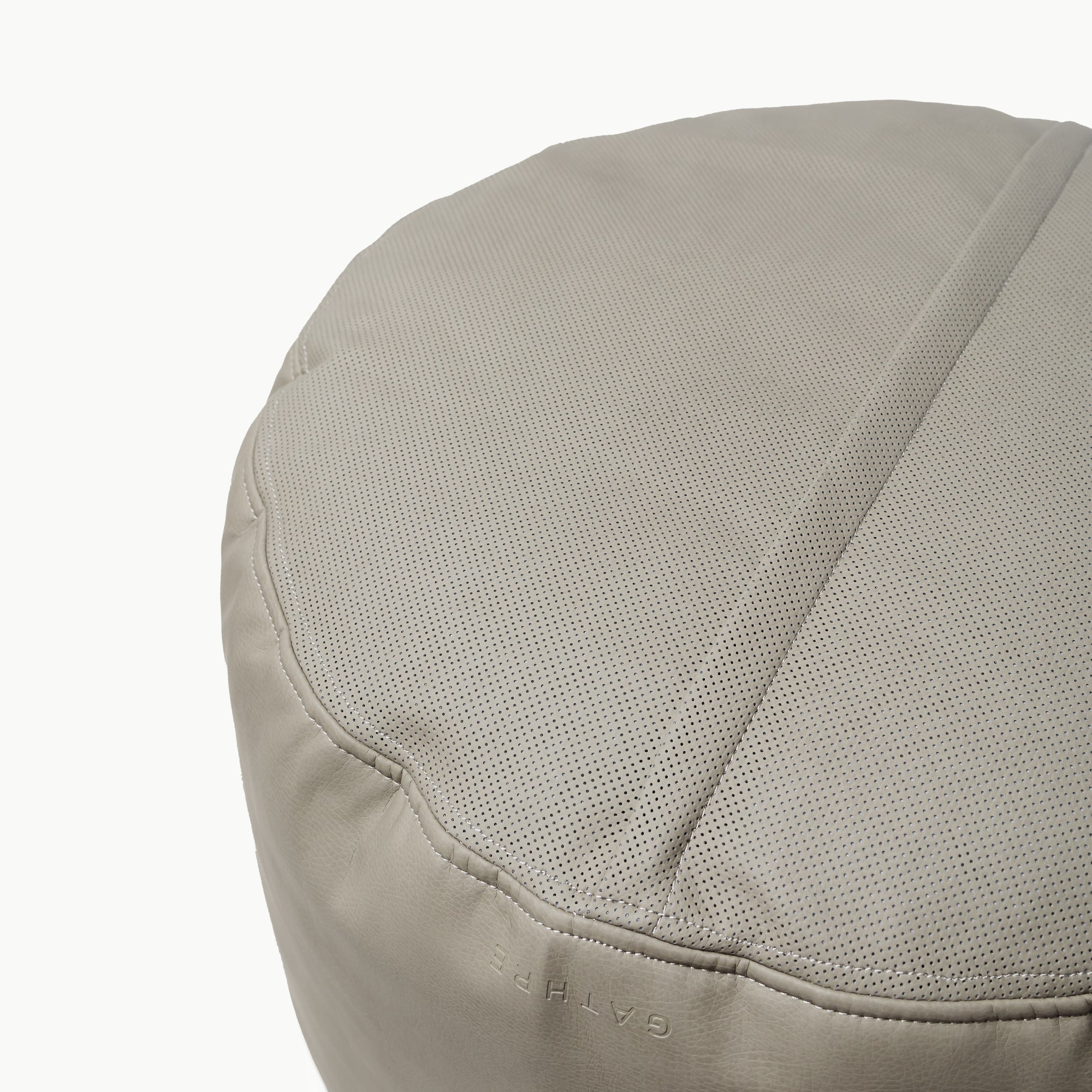 Grove (on sale)@perforated bottom on the grove circle pouf