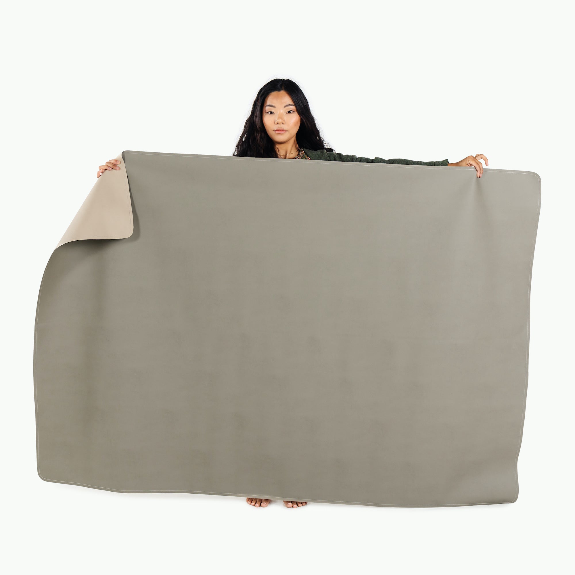 Grove • Millet (on sale) / 6 Foot@woman holding the grove/millet 6 foot table cloth