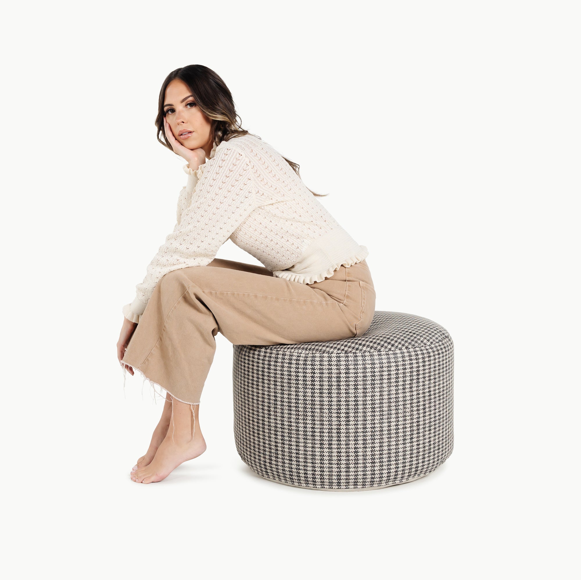 Houndstooth (on sale)@woman sitting on the houndstooth circle pouf