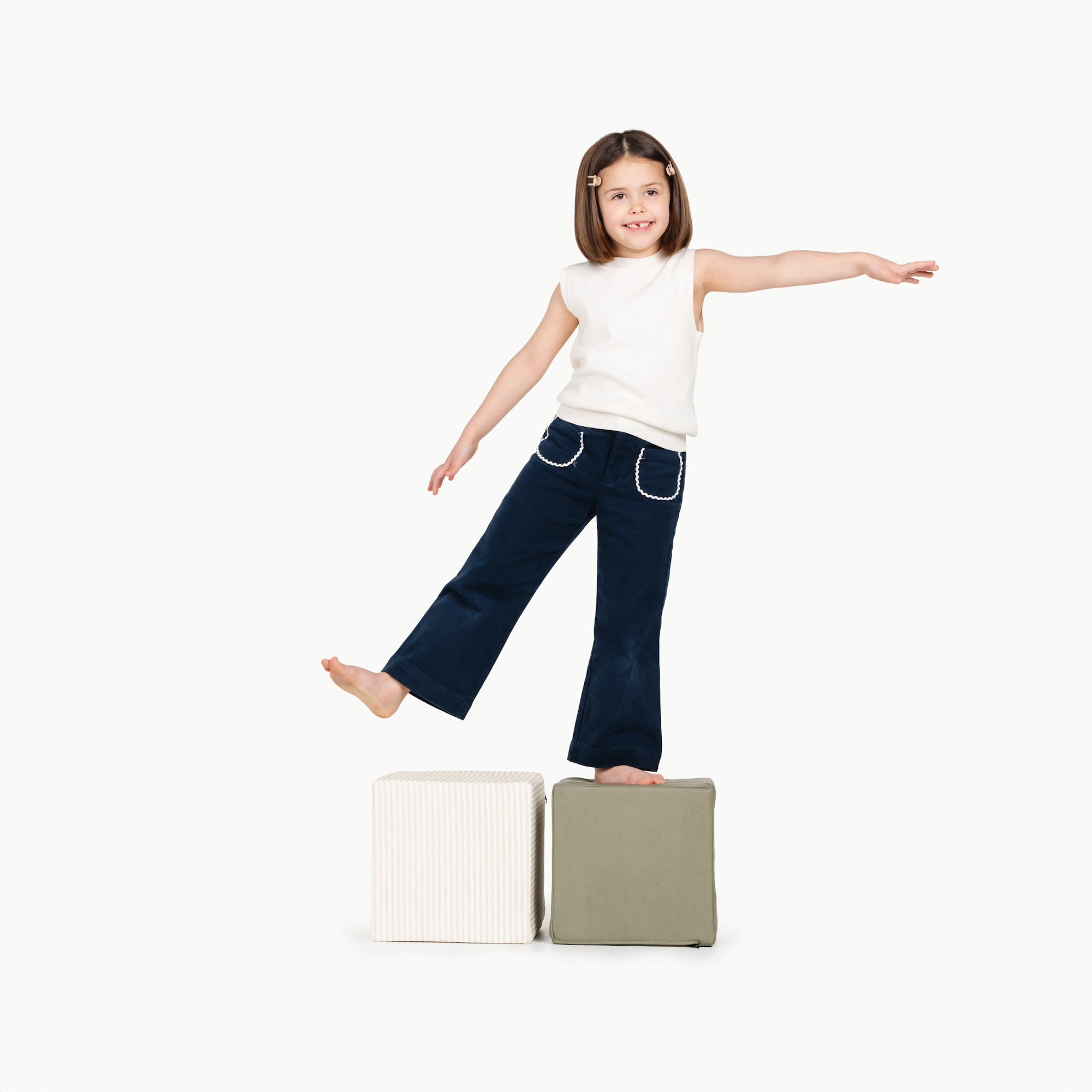 Pinstripe • Fern@little girl playing on cubes