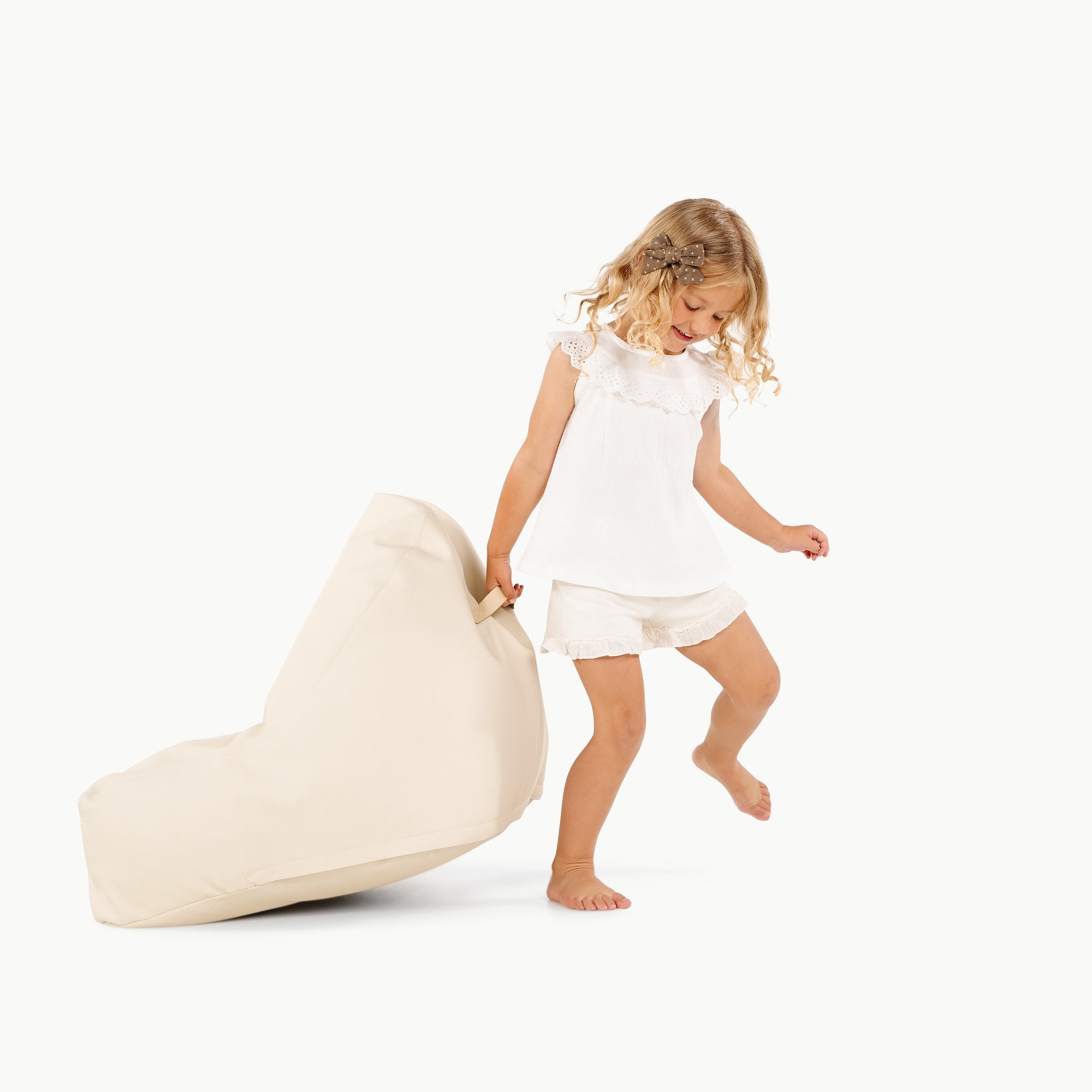Ivory@little girl playing with mini lounger