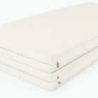 Ivory@Ivory Tumbling Mat folded up showing zipper detail