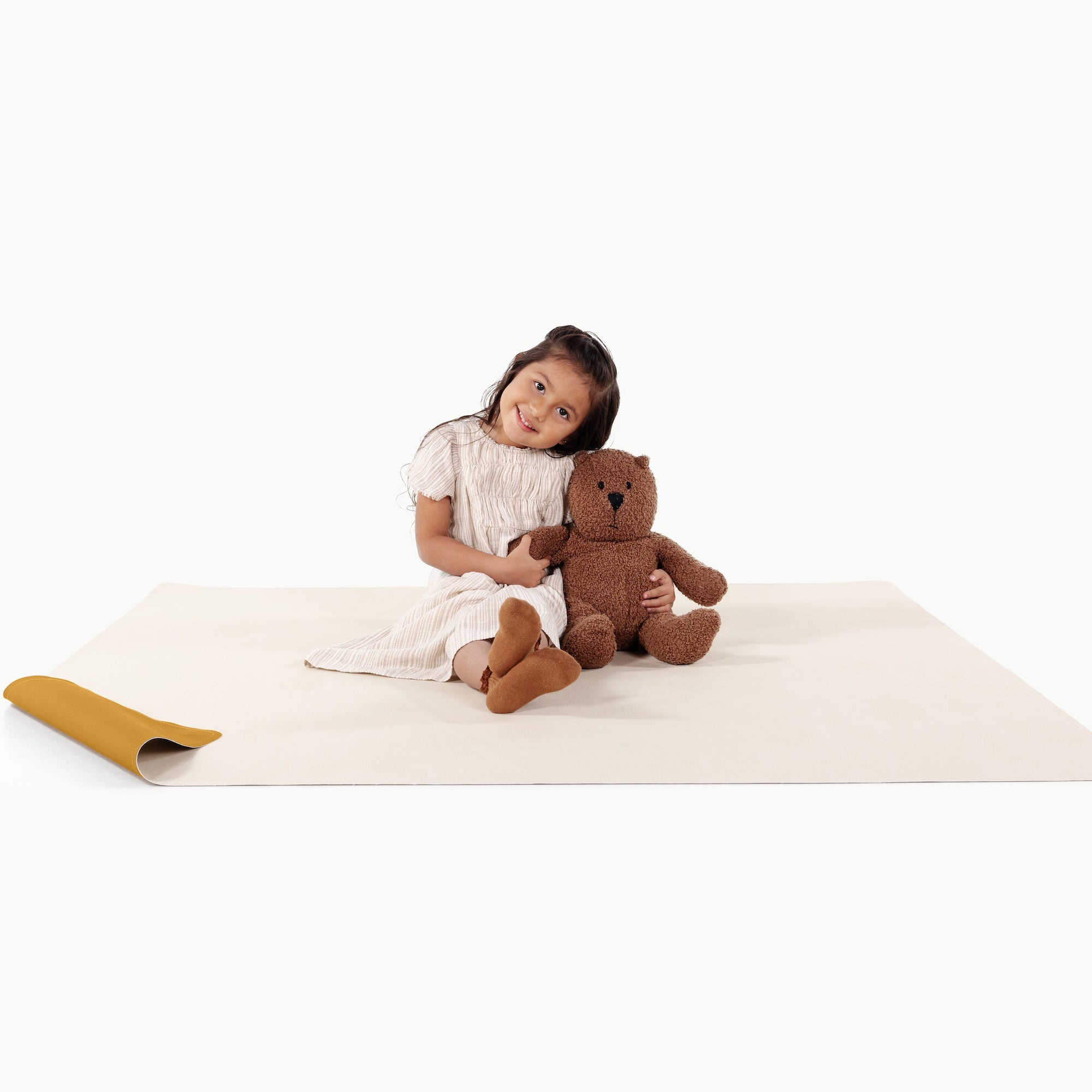 Saffron • Ivory@little girl on a double sided mat