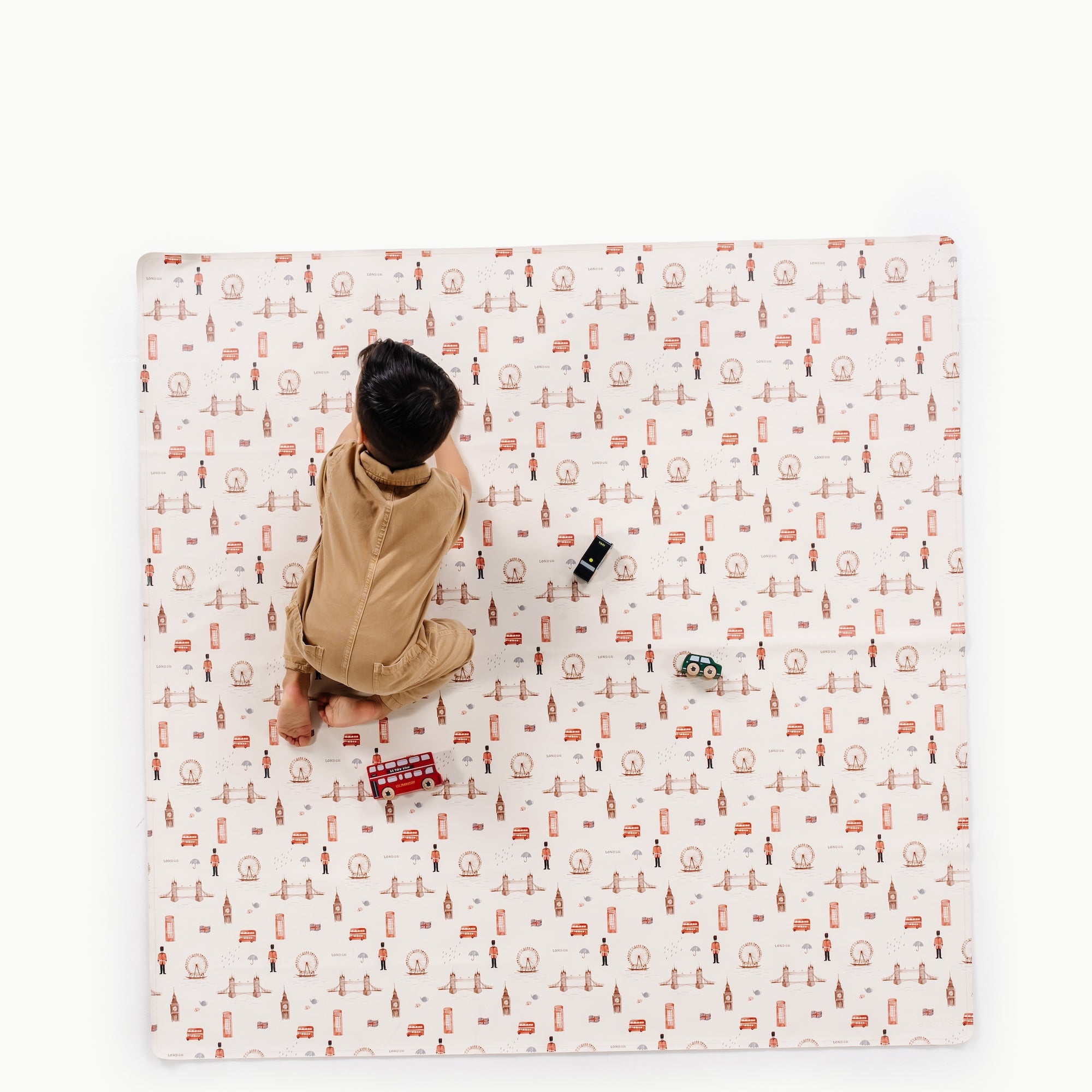 London (on sale)@overhead of kid playing on the london midi mat