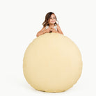 Mellow / Circle@little girl holding floor cushion