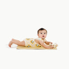 Mellow@baby lying on micro changing mat