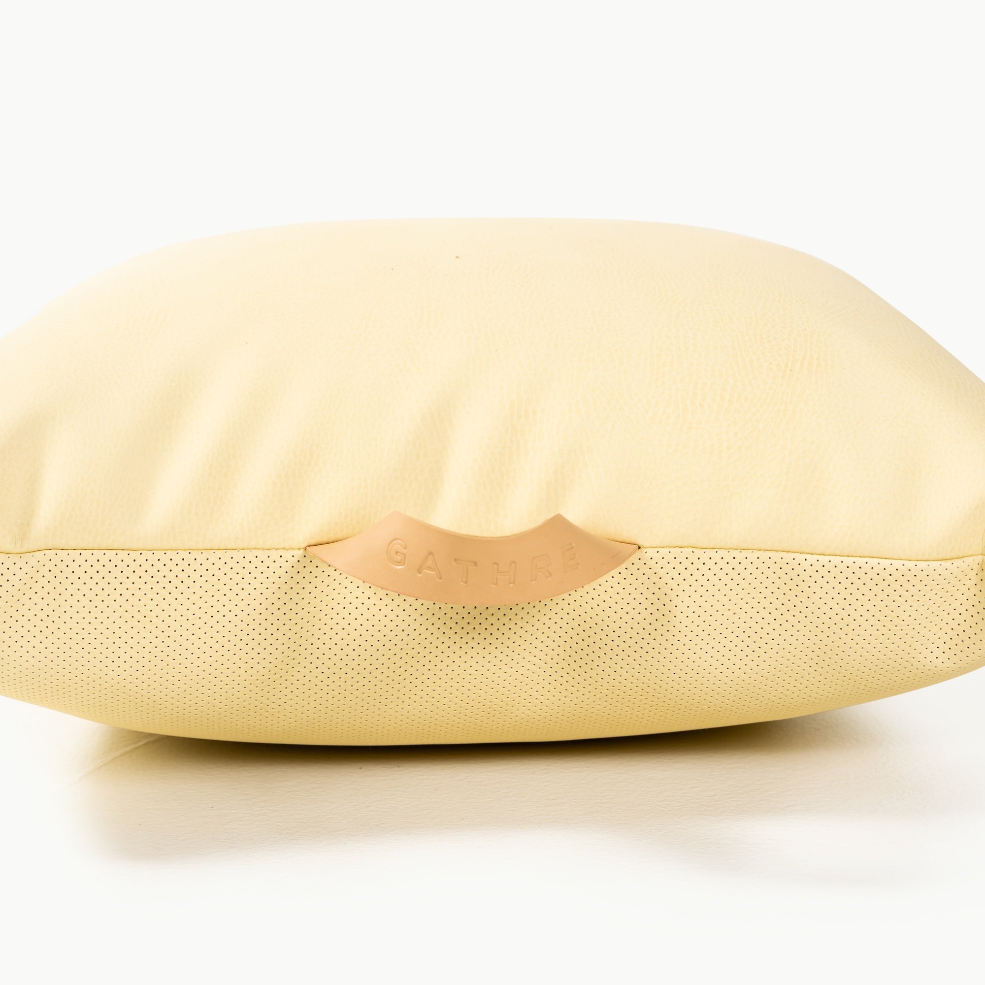 Mellow / Square@handle detail on a mini cushion