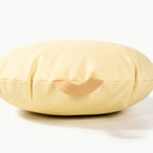 Mellow / Circle@handle on a mini cushion