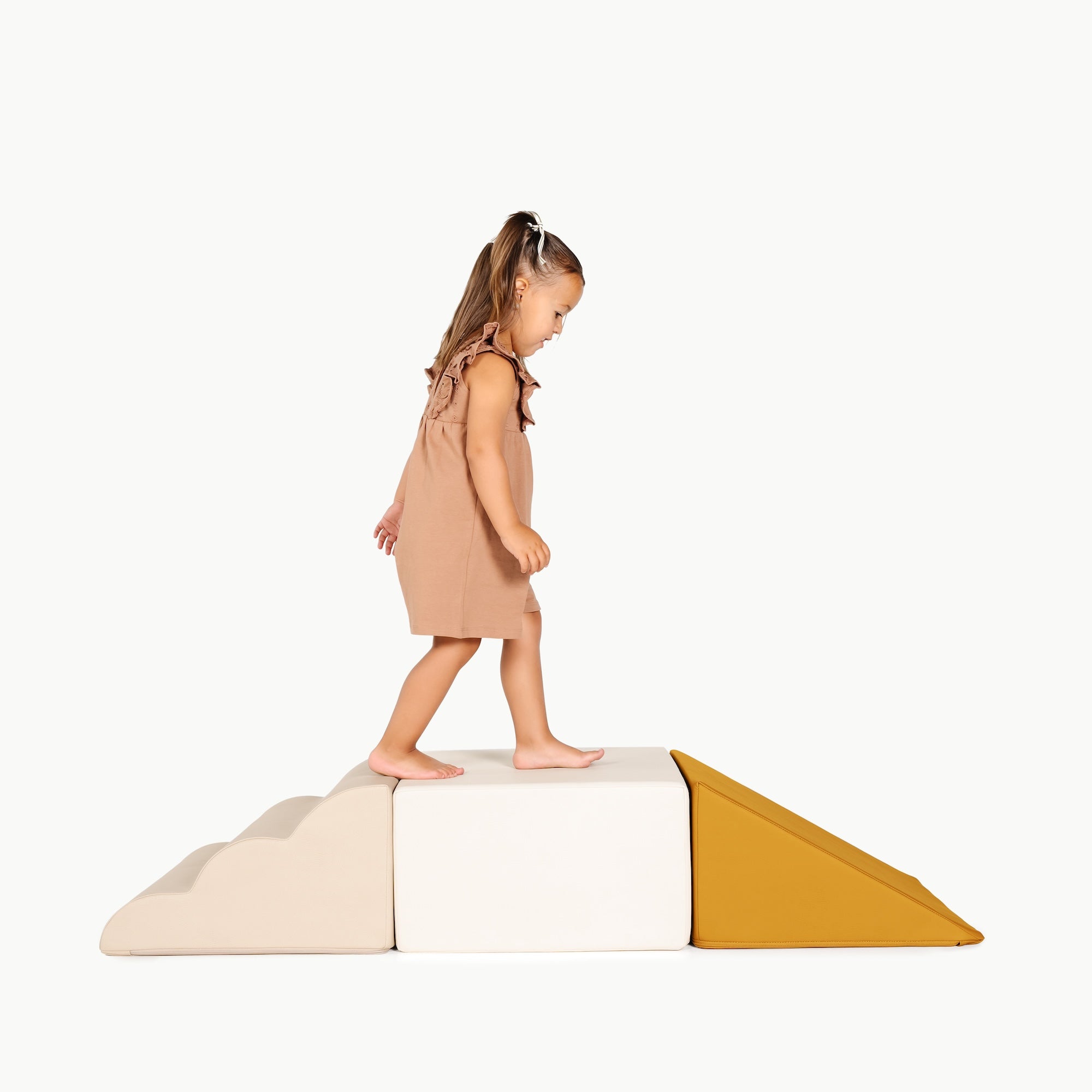 Ivory • Millet • Saffron@little girl playing on the mini climber