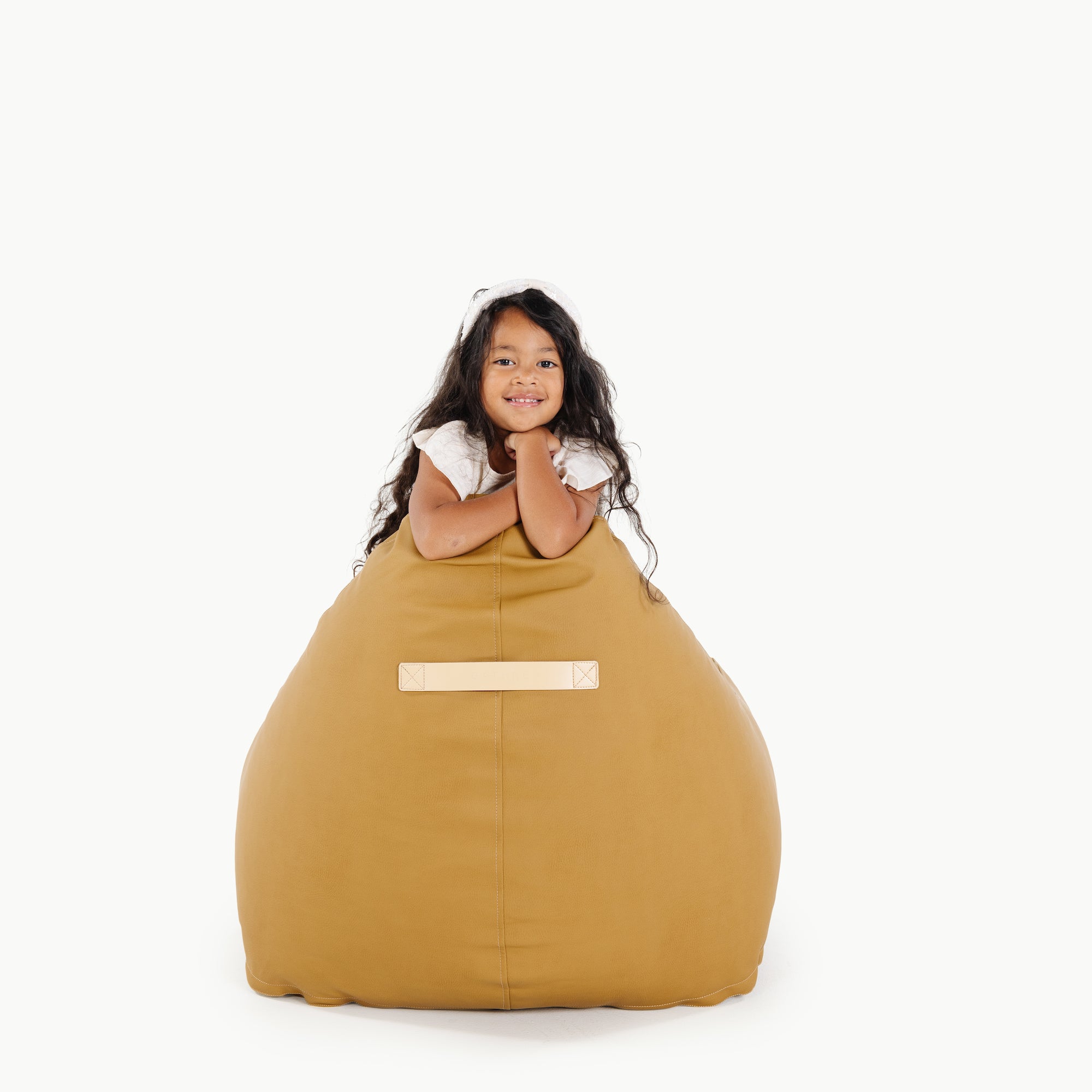 Ochre (on sale)@Kid sitting on the Ochre Lounger