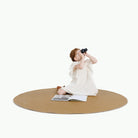 Ochre (on sale) / Circle@Kid sitting on the Ochre Midi Circle Mat